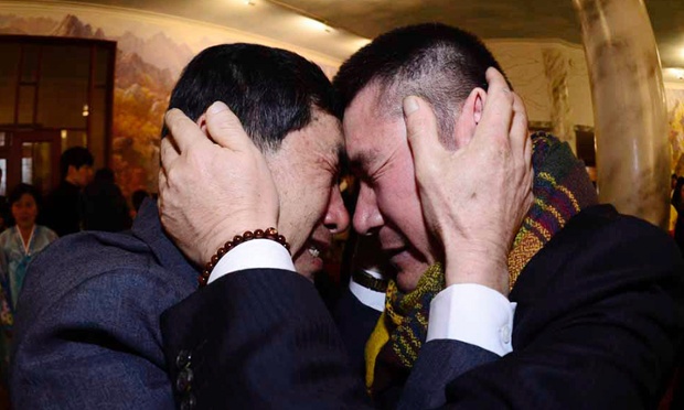South Korean Park Yang-gon, left, and his North Korean brother Park Yang Soo get emotional as they met during the Separated Family Reunion Meeting at Diamond Mountain resort in North Korea, Thursday, Feb. 20, 2014. Elderly North and South Koreans separated for six decades are tearfully reuniting, grateful to embrace children, brothers, sisters and spouses they had thought they might never see again. (AP Photo/Korea Pool, Park Hae-soo)  KOREA OUT